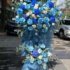 Kệ hoa khai trương tone xanh dương